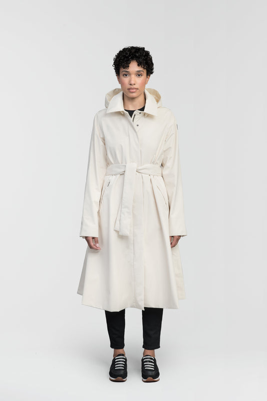 Ivy Ladies Tailored Trench Coat in knee length, 3-Ply Micro Denier fabrication, retractable non-removable hood, front wind flap with snap button closure, removable belt, and adjustable snap cuffs, in Wheat + Wheat / XS
