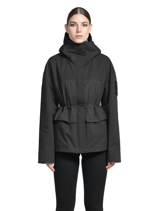 Opal Women's Performance Short Shell Jacket in hip length, premium cotton blend and contrast iridescent fabrication, adjustable drawcord at waist, non-removable hood with reflective trim, adjustable hood draw cord at interior collar, zippered side entry pockets at waist, top entry flap pockets at waist, adjustable snap cuffs, snap button wind flap, two-way branded zipper at centre front, and interior zipper pocket, in Black