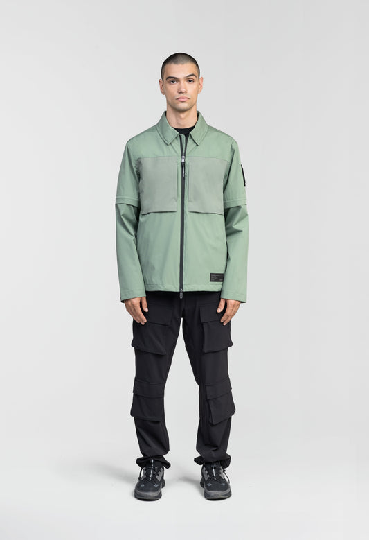 Thurlow Men's Performance Zip Off Sleeve Rain Shirt in hip length, convertible collar, patch chest zipper pockets, hidden in-seam pockets, zip off sleeves, centre front two-way zipper closure, in Duck Green