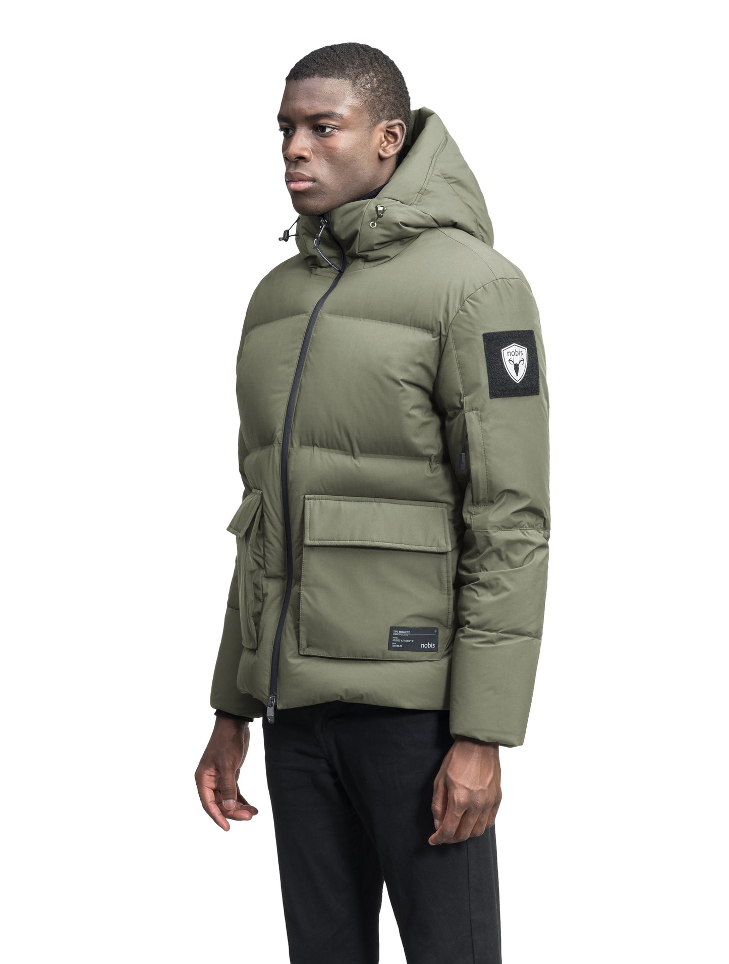 Supra Men's Performance Puffer in hip length, Technical Taffeta and 3-Ply Micro Denier fabrication, Premium Canadian White Duck Down insulation, non-removable down filled hood, centre front two-way zipper, flap pockets at waist, and zipper pocket at left bicep, in Clove