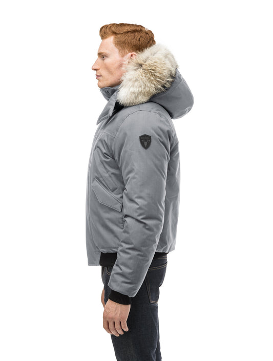 Men's classic down filled bomber jacket with a down filledÃƒÆ’Ã†â€™Ãƒâ€ Ã¢â‚¬â„¢ÃƒÆ’Ã¢â‚¬Â ÃƒÂ¢Ã¢â€šÂ¬Ã¢â€žÂ¢ÃƒÆ’Ã†â€™Ãƒâ€šÃ‚Â¢ÃƒÆ’Ã‚Â¢ÃƒÂ¢Ã¢â€šÂ¬Ã…Â¡Ãƒâ€šÃ‚Â¬ÃƒÆ’Ã¢â‚¬Â¦Ãƒâ€šÃ‚Â¡ÃƒÆ’Ã†â€™Ãƒâ€ Ã¢â‚¬â„¢ÃƒÆ’Ã‚Â¢ÃƒÂ¢Ã¢â‚¬Å¡Ã‚Â¬Ãƒâ€¦Ã‚Â¡ÃƒÆ’Ã†â€™ÃƒÂ¢Ã¢â€šÂ¬Ã…Â¡ÃƒÆ’Ã¢â‚¬Å¡Ãƒâ€šÃ‚Â hood that features a removable coyote fur trim and concealed moldable framing wire in Concrete + Concrete