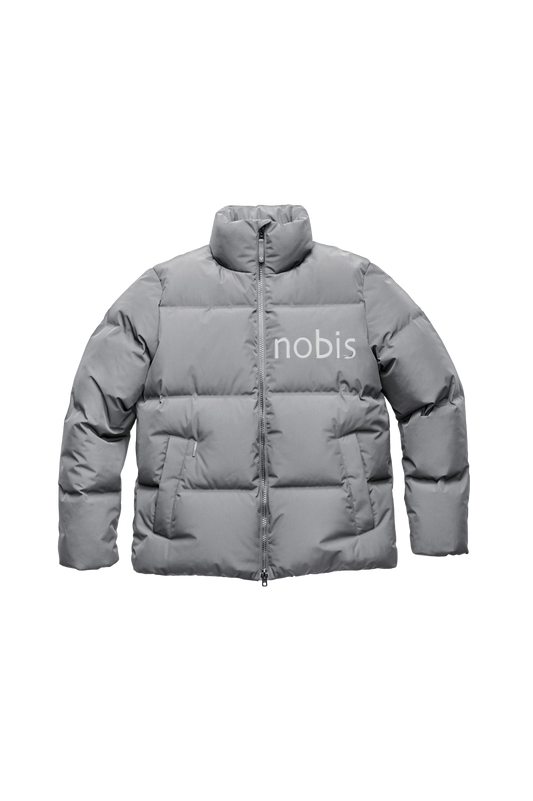 Men's puffer jacket with a minimalist modern design; featuring graphic details like oversized tonal branding, an exposed zipper, and seamless puffer channels in Concrete + Concrete