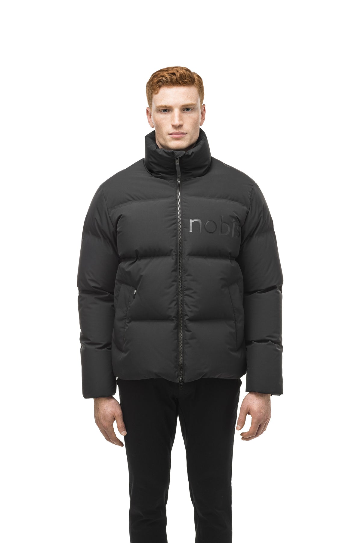 Men's puffer jacket with a minimalist modern design; featuring graphic details like oversized tonal branding, an exposed zipper, and seamless puffer channels in Black