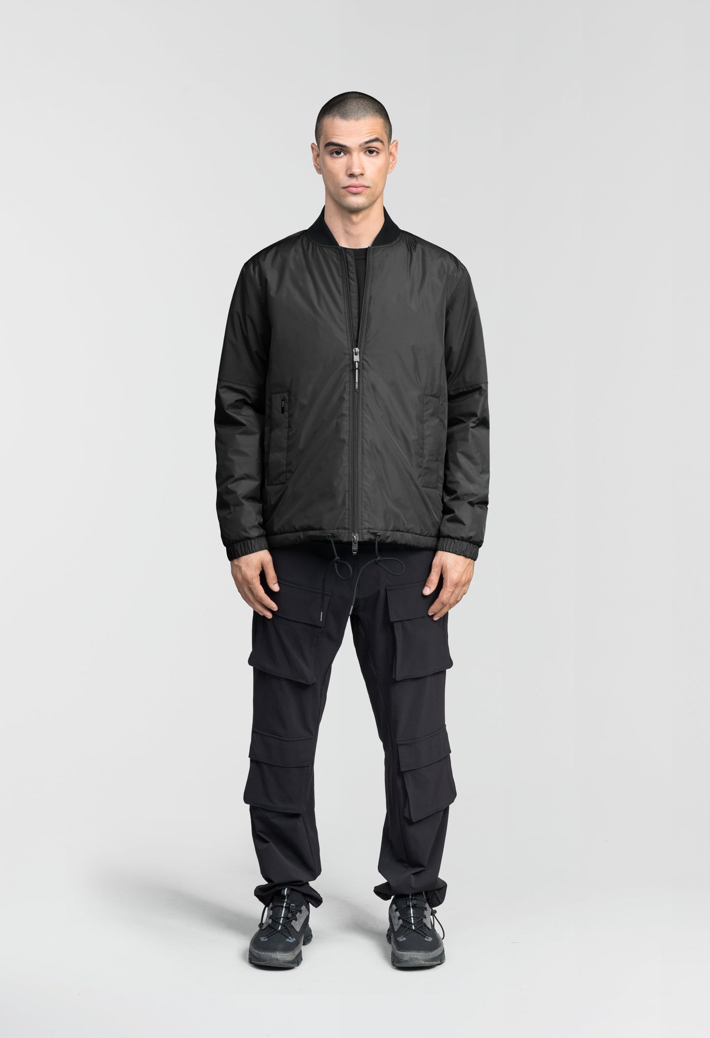 Edgemont Men's Tailored Coach Jacket in hip length, rib knit collar, elastic cuffs, centre front two-wau zipper, single welt waist pockets, adjustable waist drawstring, in Black