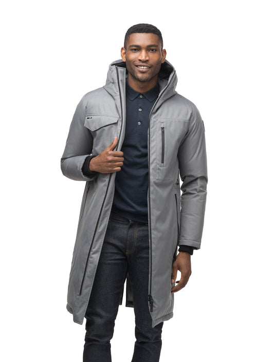 Long men's calf length parka with down fill and exposed zipper that features spacious pockets and zippered vents in Concrete + Concrete