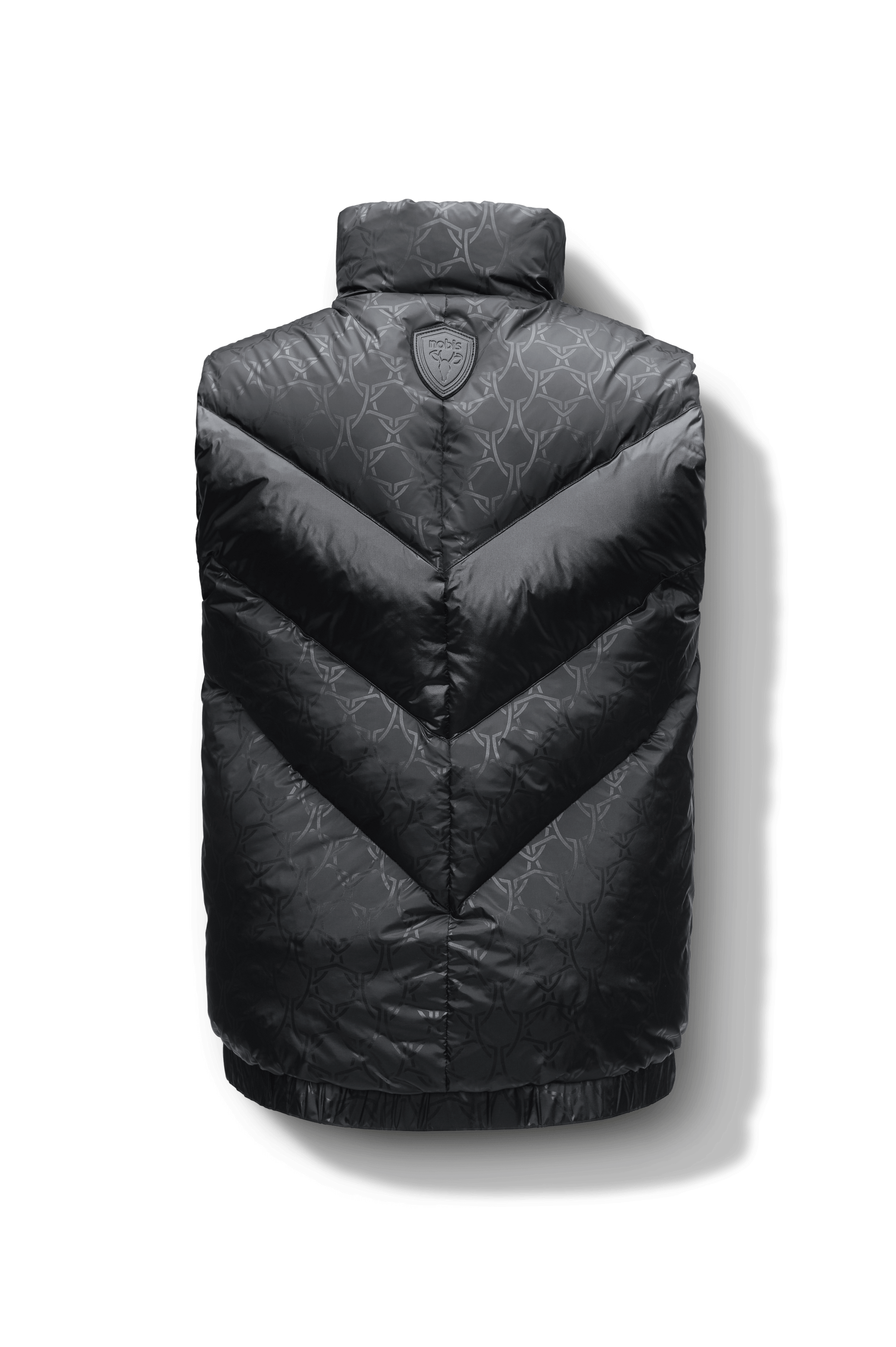 Kylo Men's Chevron Quilted Vest in hip length, premium cire technical nylon taffeta fabrication, Premium Canadian origin White Duck Down insulation, two-way centre-front zipper, fleece-lined pockets at waist, elasticized waistband, in Shield Monogram