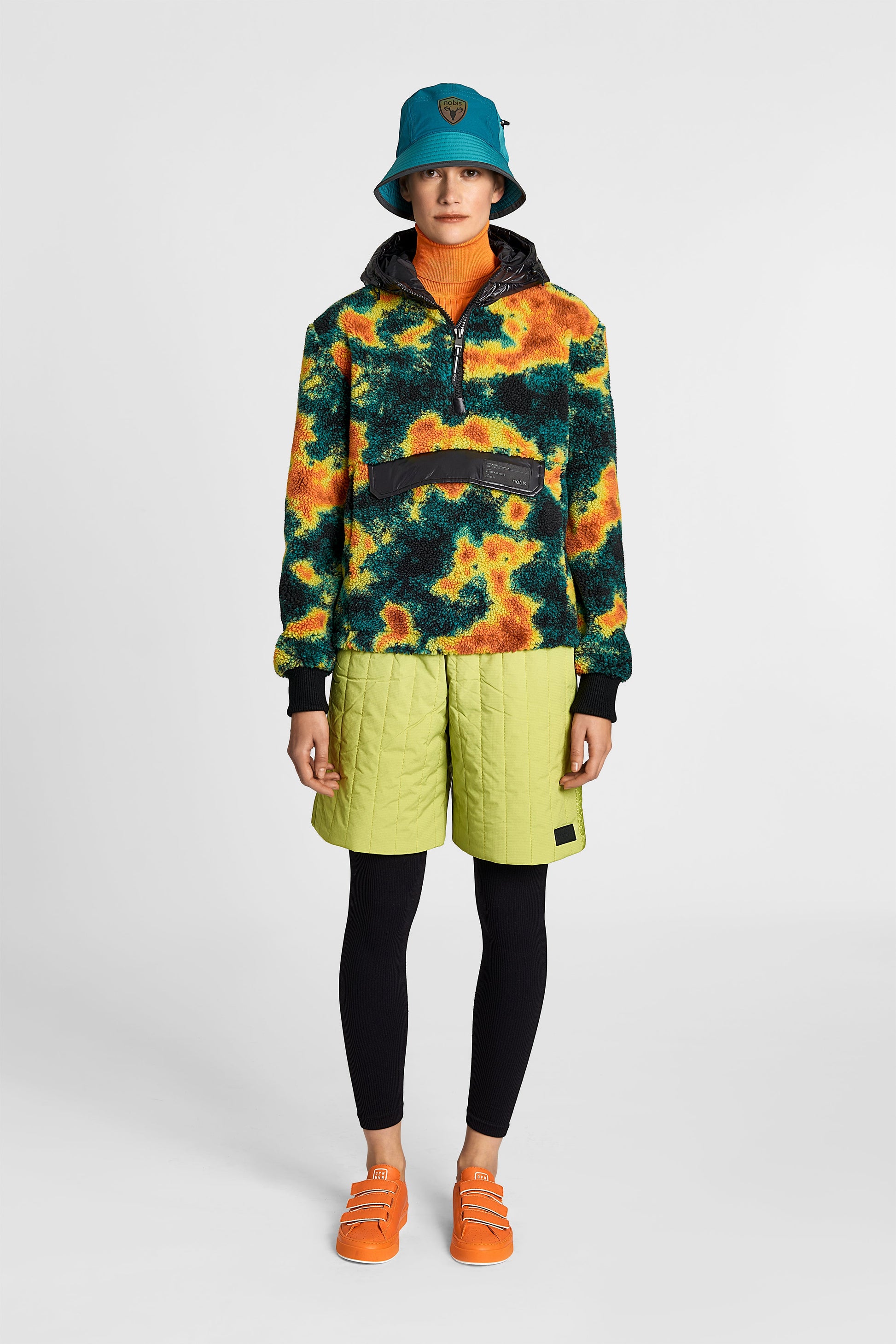 Roche Women's Hybrid Berber Pullover Hoodie in hip length, premium berber and cire technical nylon taffeta fabrication, Primaloft Gold Insulation Active+, non-removable hood with zipper at collar, kangaroo pocket with magnetic closure flap and additional side-entry pockets, ribbed cuffs, adjustable drawcords at side hem, in Heat Map