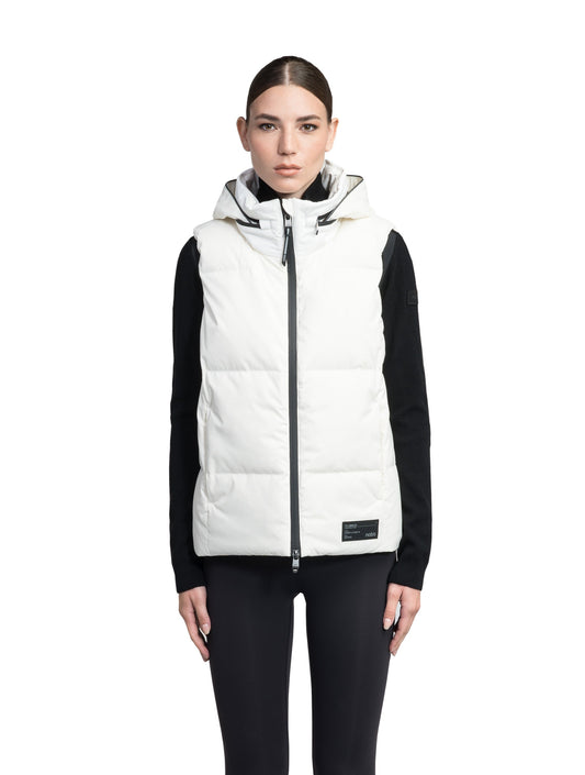 Oren Ladies Performance Vest in hip length, Durable Stretch Ripstop and 3-Ply Micro Denier fabrication, Premium Canadian White Duck Down insulation, tuck-away waterproof hood, and two-way centre front zipper, in Chalk + Chalk
