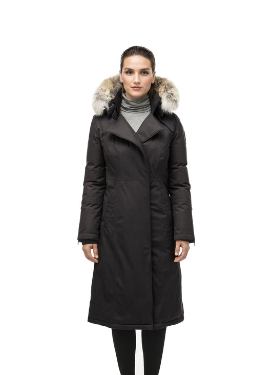 Long calf length women's trench inspired parka with removable fur trim around the hood and an asymetric closure in Black + Black