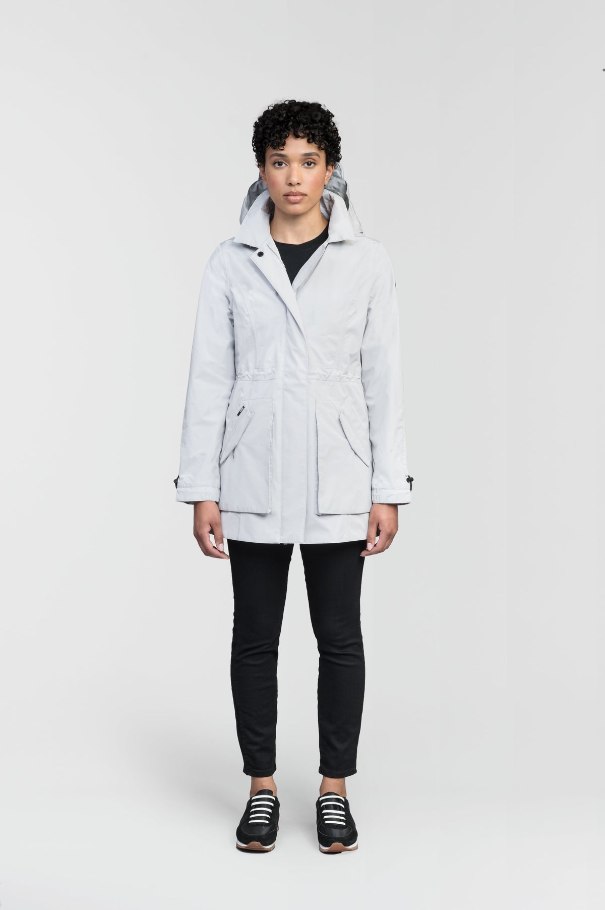 Women's thigh length raincoat with collar and non-removable hood in Light Grey