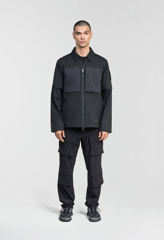 Thurlow Men's Performance Zip Off Sleeve Rain Shirt in hip length, convertible collar, patch chest zipper pockets, hidden in-seam pockets, zip off sleeves, centre front two-way zipper closure, in Black + Black