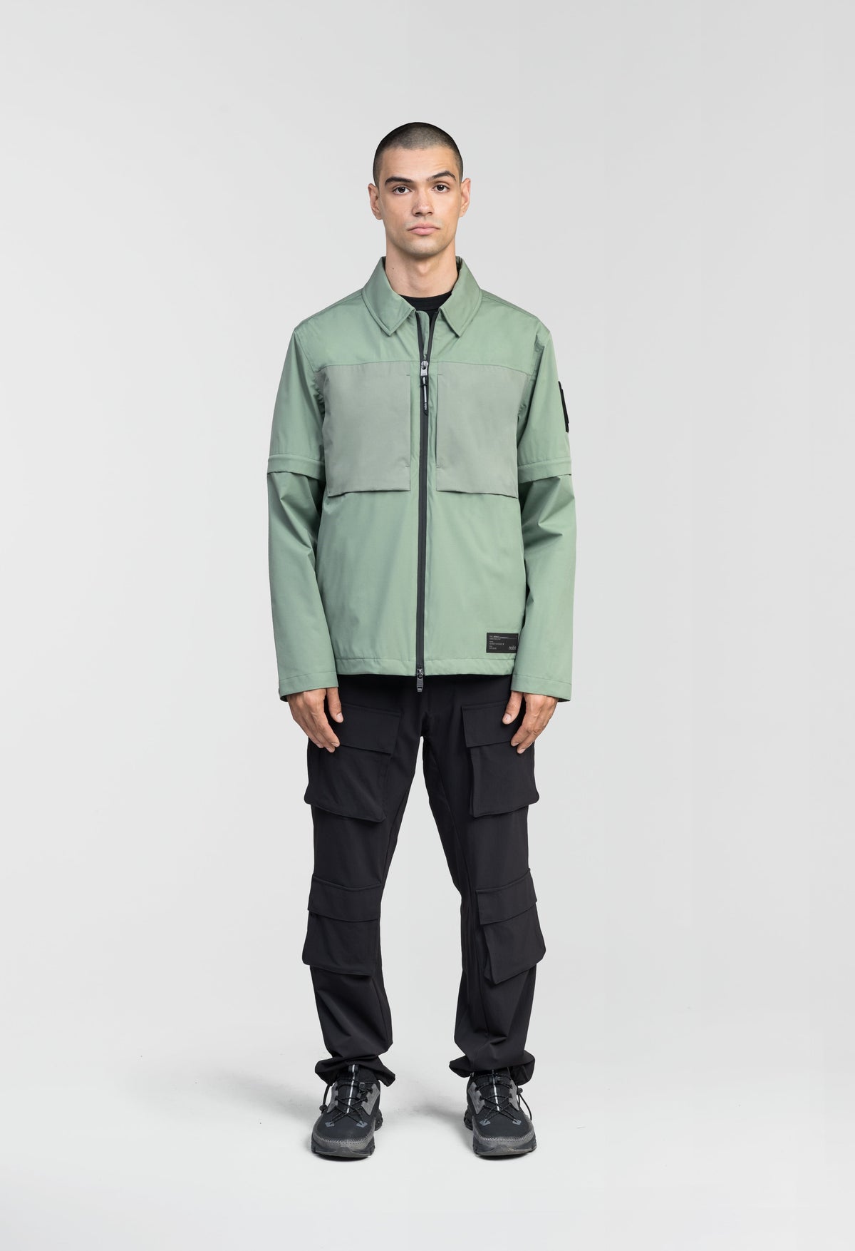 Thurlow Men's Performance Zip Off Sleeve Rain Shirt in hip length, convertible collar, patch chest zipper pockets, hidden in-seam pockets, zip off sleeves, centre front two-way zipper closure, in Duck Green