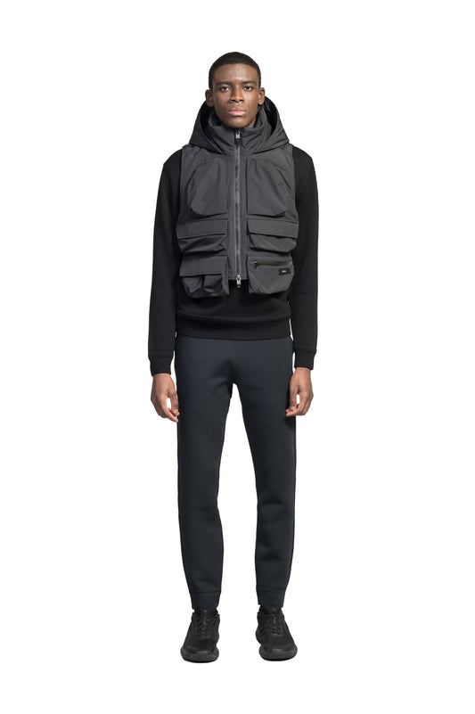 Vulcan Unisex Tactical Vest in waist length, Primaloft Gold Insulation Active, non-removable hood, removable face mask, seven pockets on front and back, and two-way front zipper, in Black