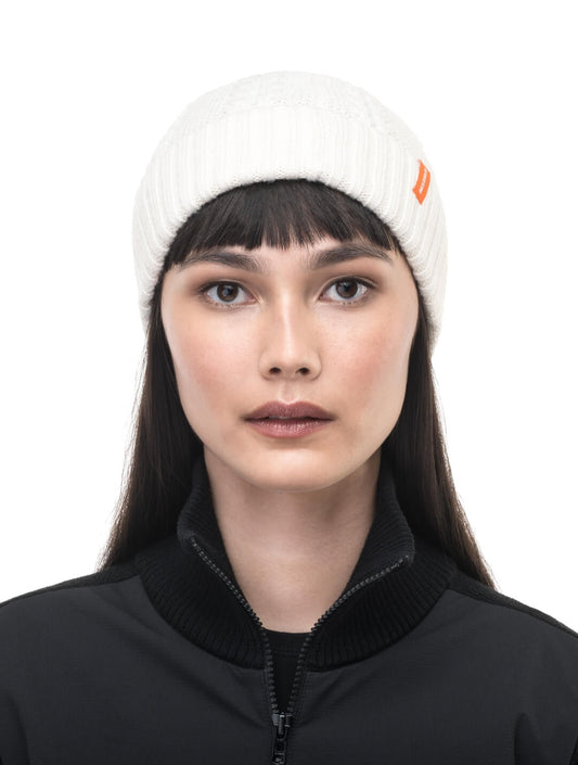 No Cold Shoulder unisex beanie with cable stitched crown, two by two rib knit cuff, with dual orange wrap labels along cuff, in Chalk + Chalk