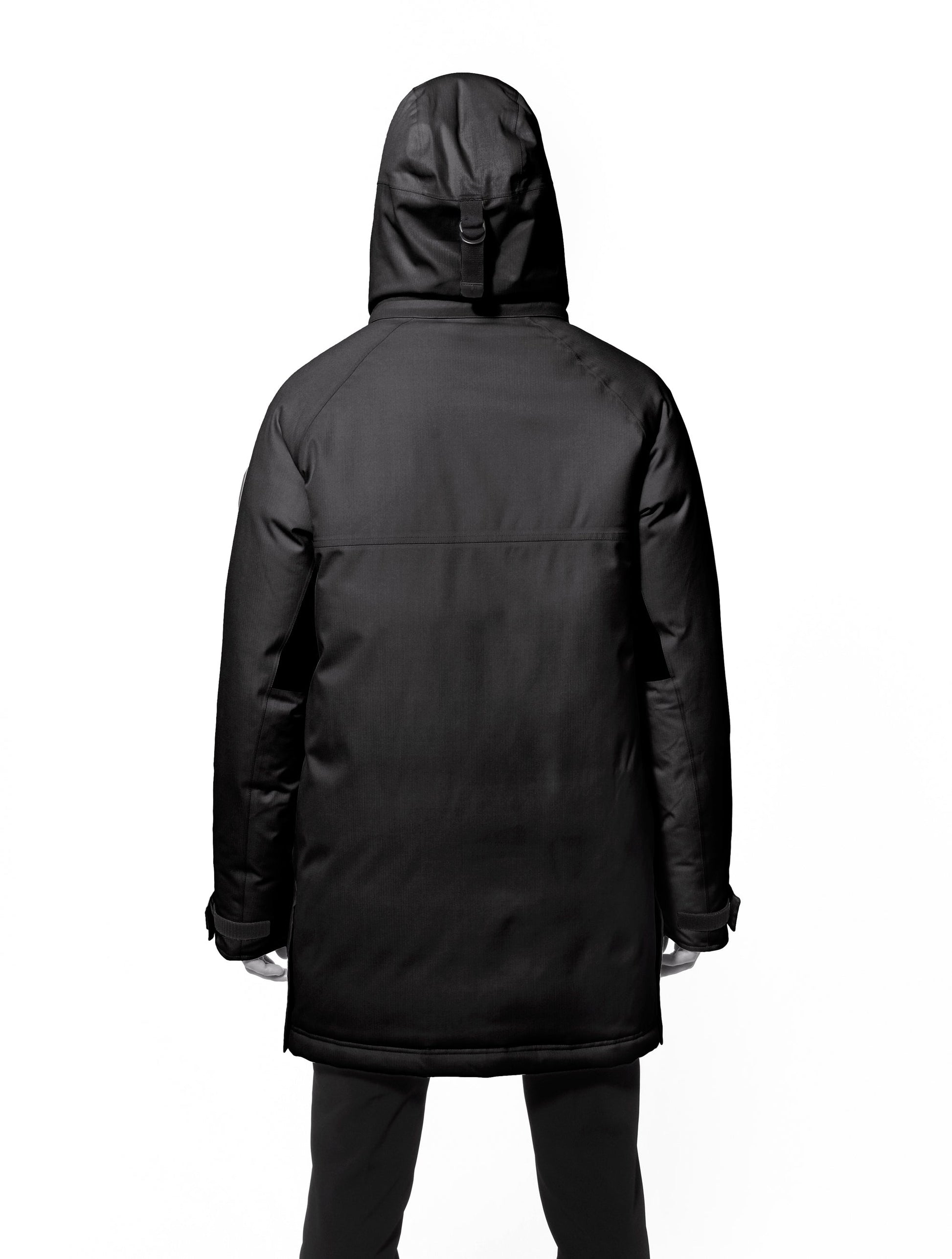 Men's thigh length down-filled parka with removable hood and removable coyote fur trim in Black