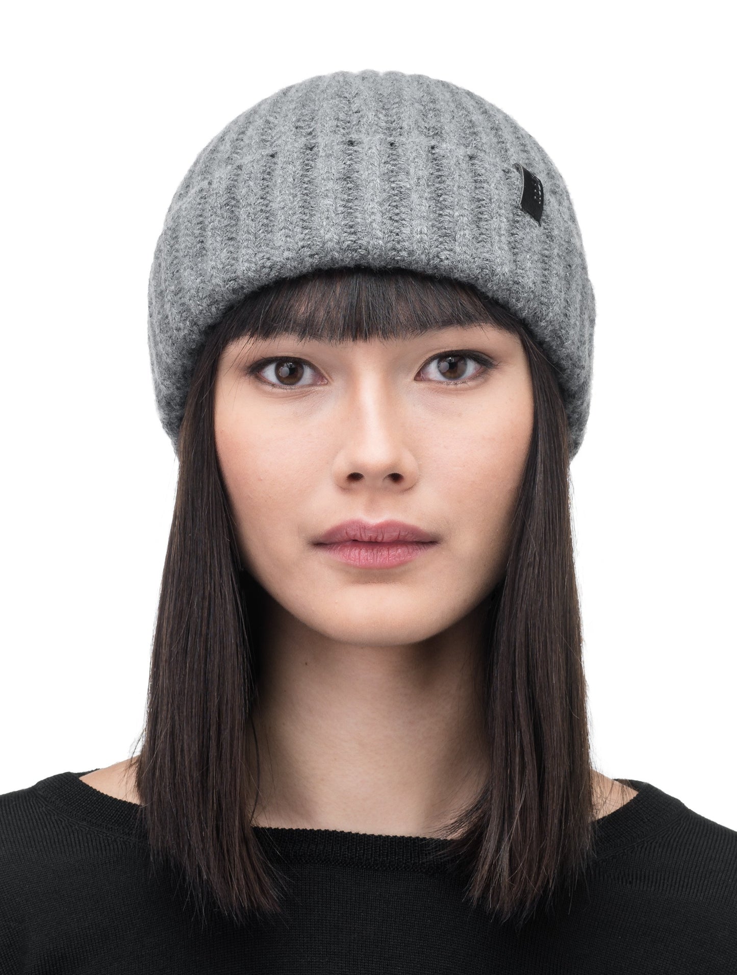 Dew Unisex Cable Knit Beanie in superfine merino wool and cashmere, and nobis leather label at cuff, in Storm