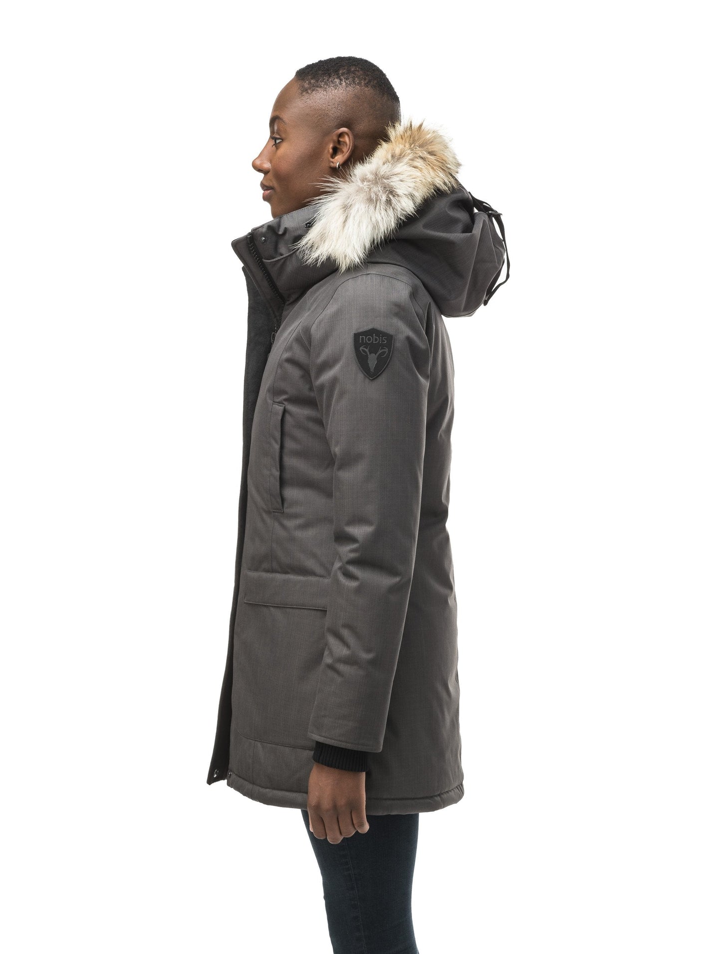 Women's down filled parka that sits just below the hip with a clean look and two hip patch pockets in CH Steel Grey