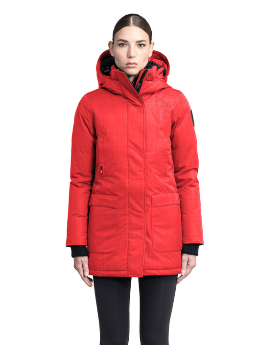 Women's down filled parka that sits just below the hip with a clean look and two hip patch pockets in BlackCarla Furless Ladies Parka in thigh length with Canadian Premium White Duck Down insulation, non-removable hood, centre-front zipper with magnetic closure wind flap, and four exterior pockets, in Vermillion