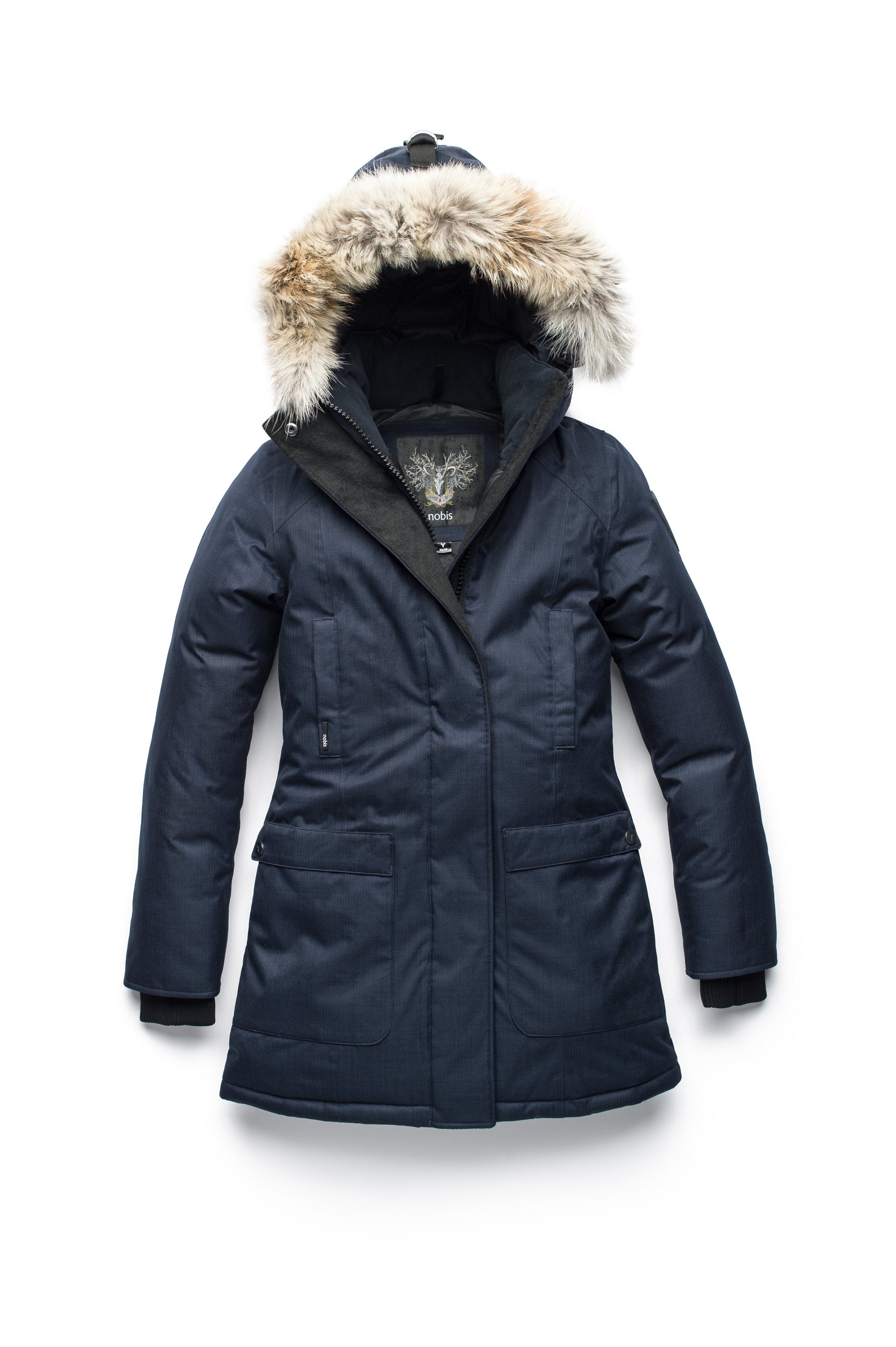Women's down filled parka that sits just below the hip with a clean look and two hip patch pockets in CH Navy