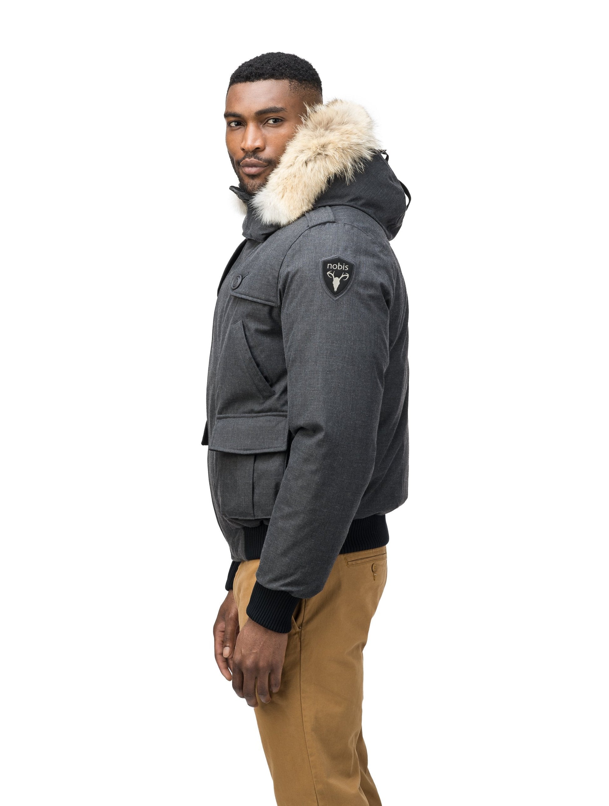 Men's down filled bomber that sits just above the hips with a completely removable hood that's windproof, waterproof, and breathable in H. Charcoal