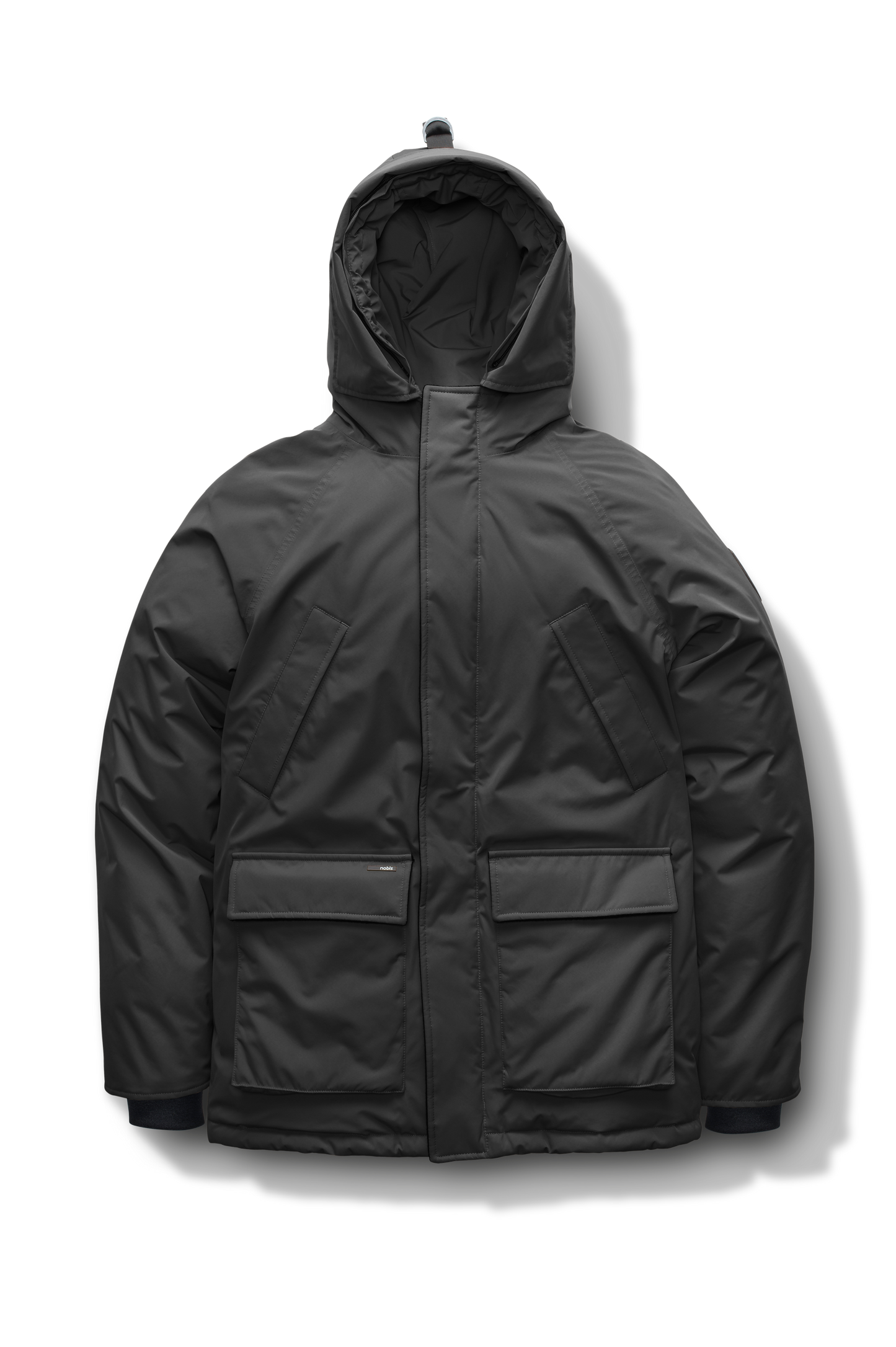 Heritage Furless Men's Parka in hip length, Canadian white duck down insulation, non-removable hood, front zipper with magnetic placket, chest hand warmer pockets, waist flap pockets, and elastic cuffs, in Black