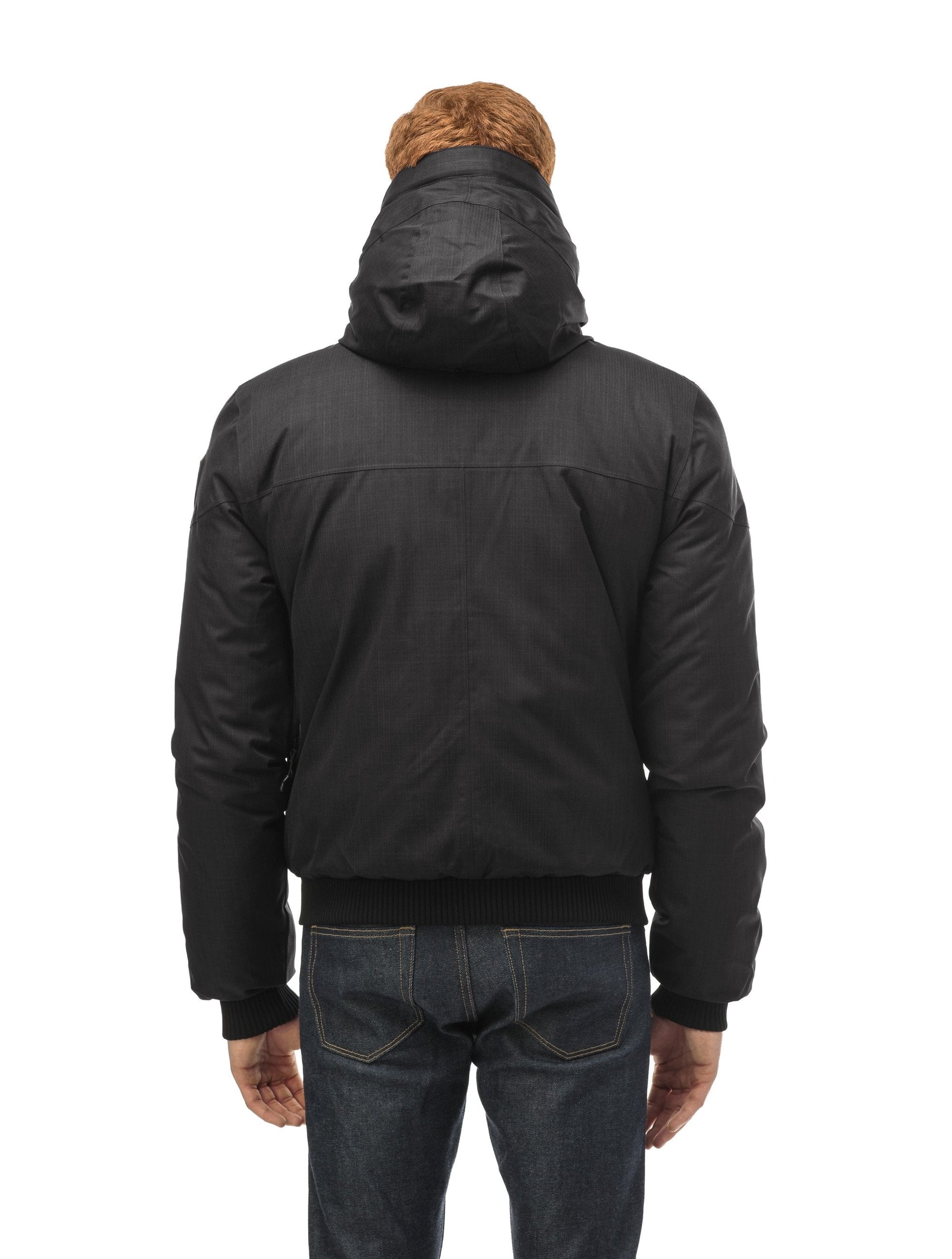 Men's classic down bomber with two patch pockets and a right shoulder storm flap in CH Black