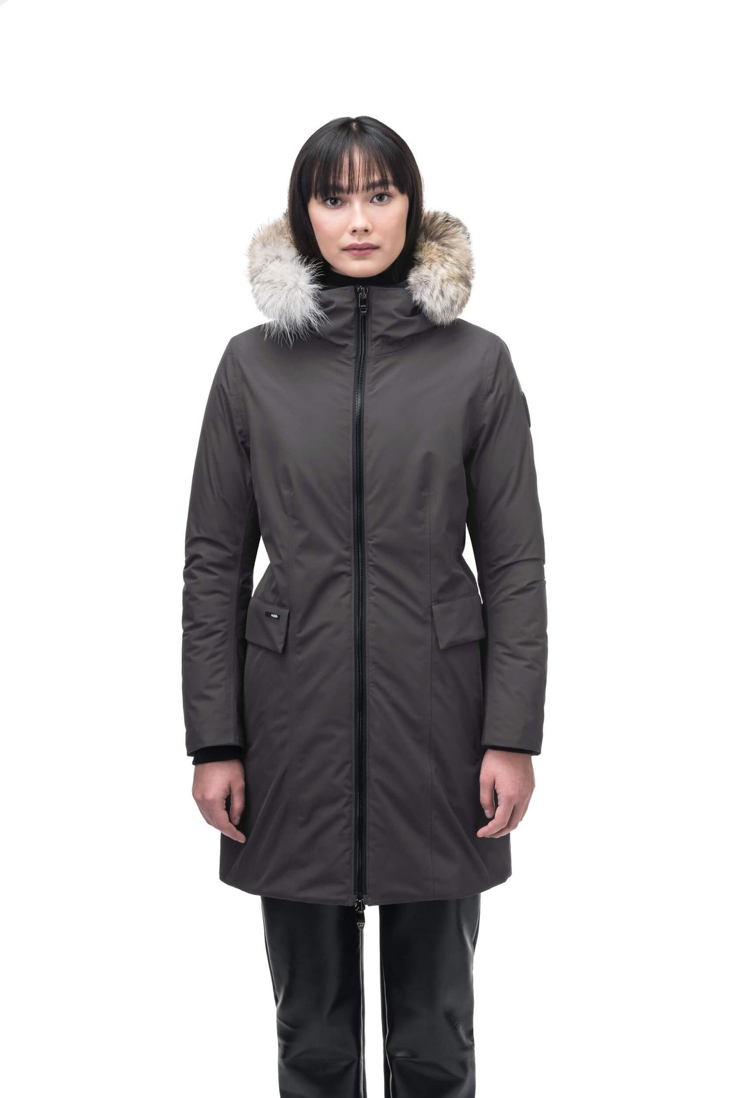 Romeda Ladies Mid Thigh Parka in thigh length, Canadian duck down insulation, non-removable hood with removable fur ruff trim, and two-way front zipper, in Steel Grey