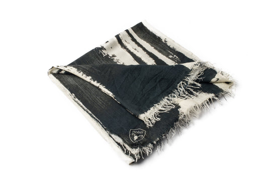 Square modal cashmere blend scarf with fringe edges in a contrast Black print