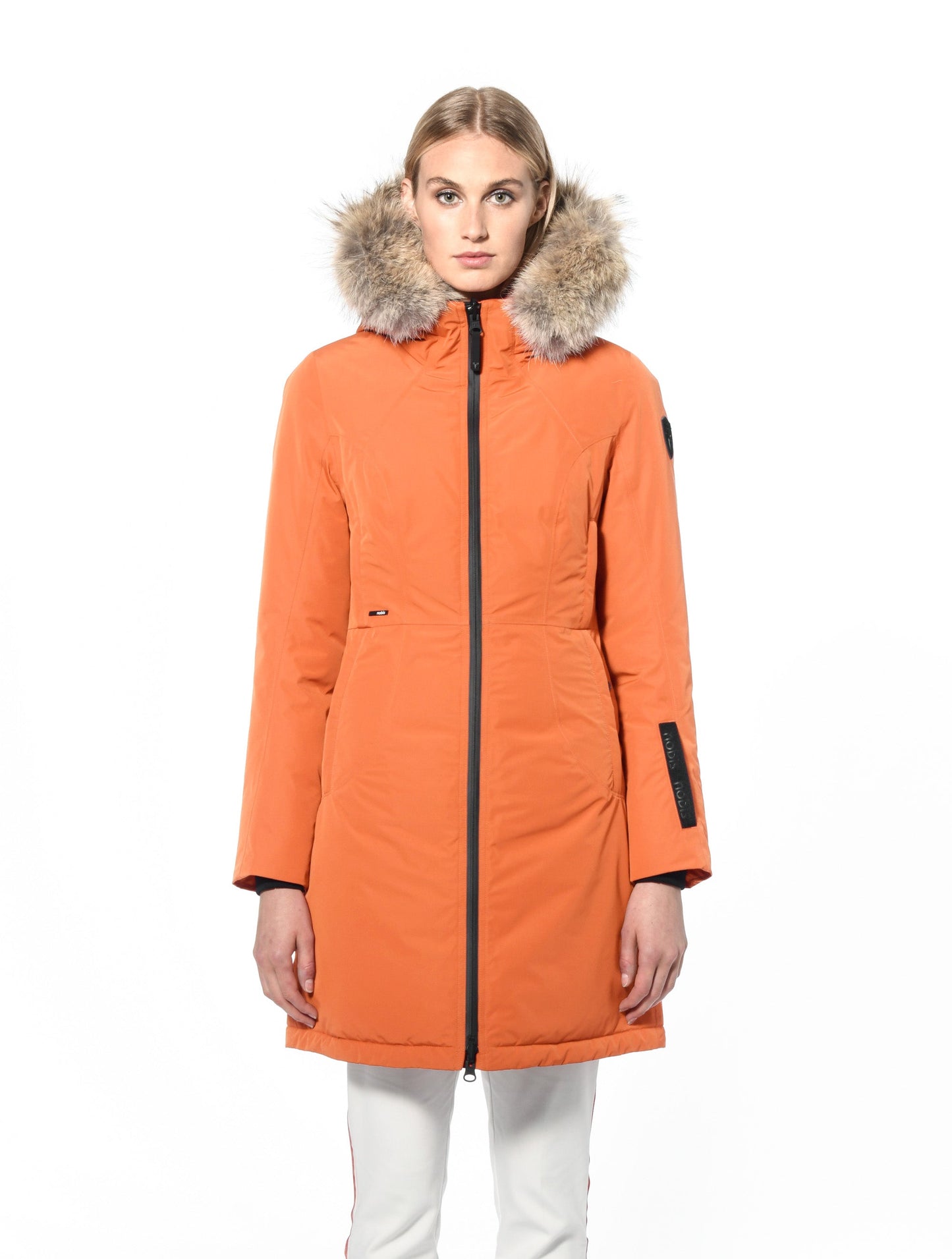 Ladies thigh length down-filled parka with non-removable hood and removable coyote fur trim in Atomic